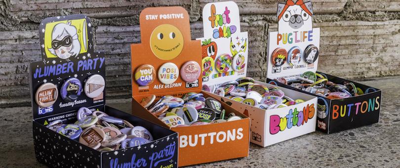 Four boxes of buttons
