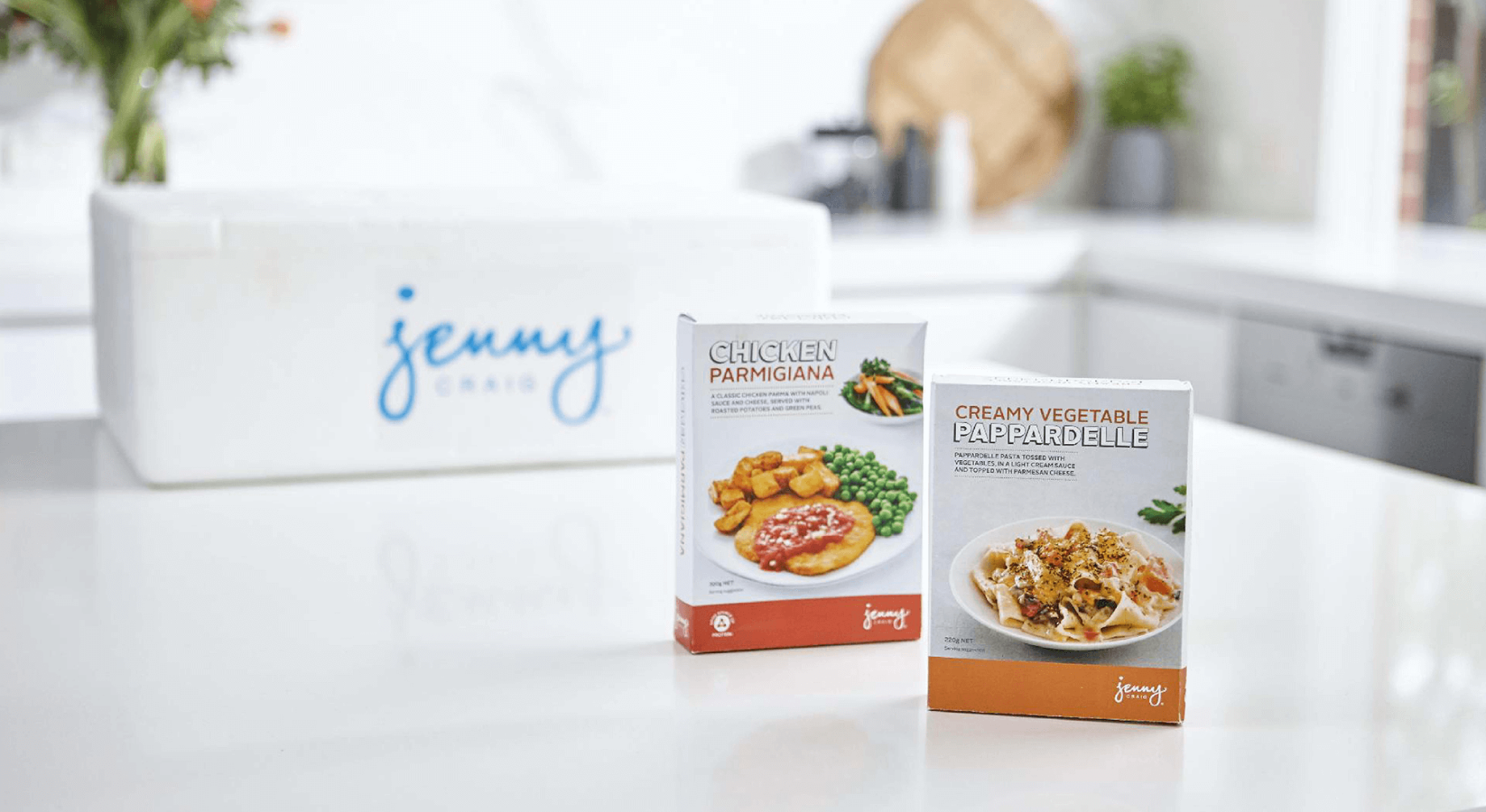 Advertisement showcasing Jenny Craig's meal delivery boxes